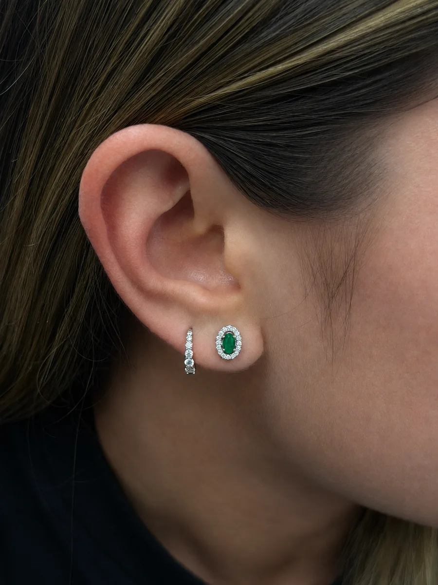 Emerald Halo Stud Earrings - Oval Cut worn
