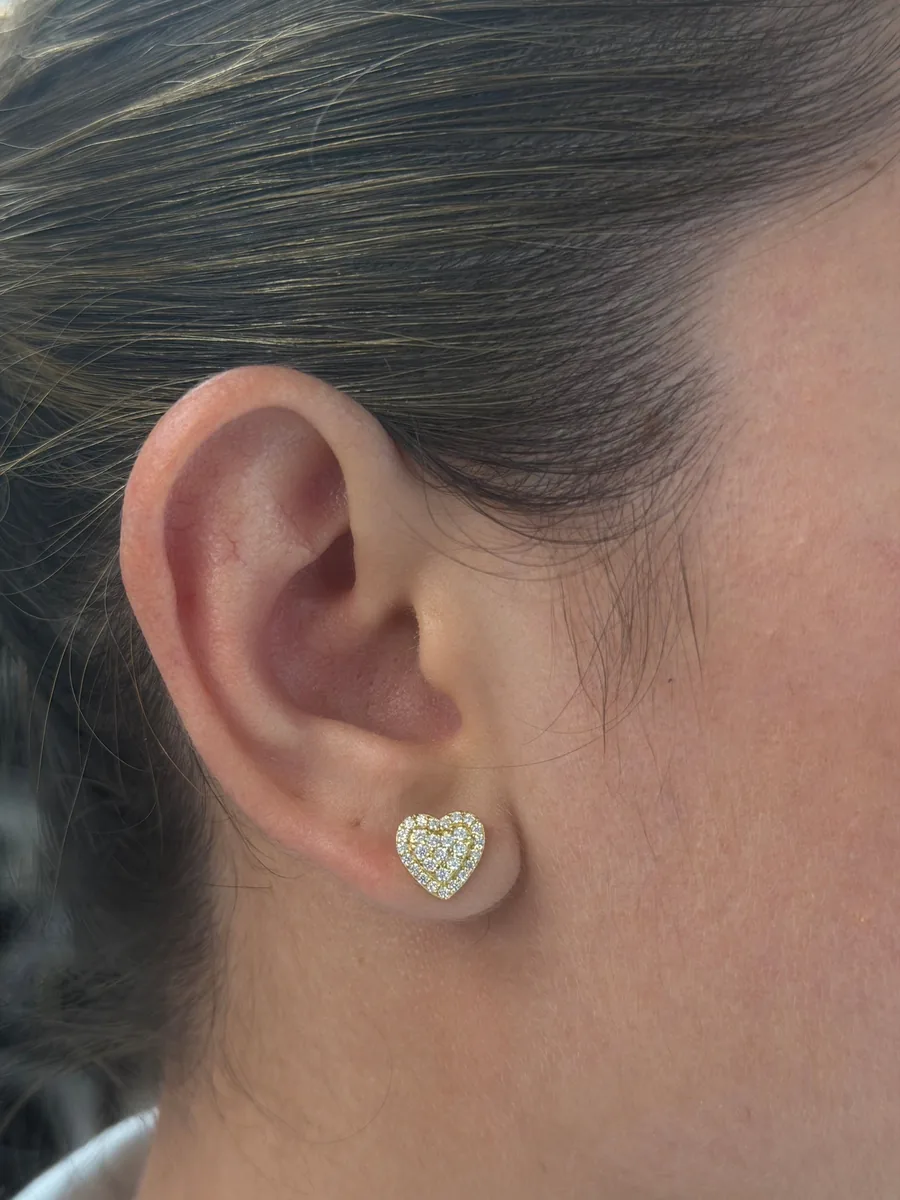 Heart pave earrings worn
