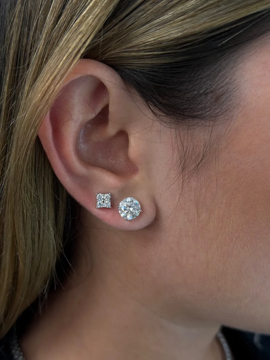 Mini clover stud earrings worn