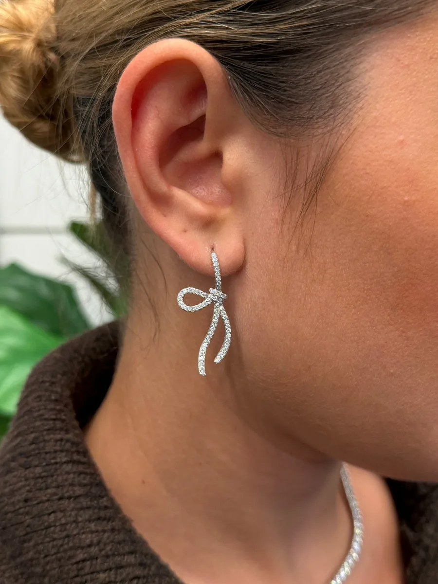 Pavé Bow Drop Earrings worn
