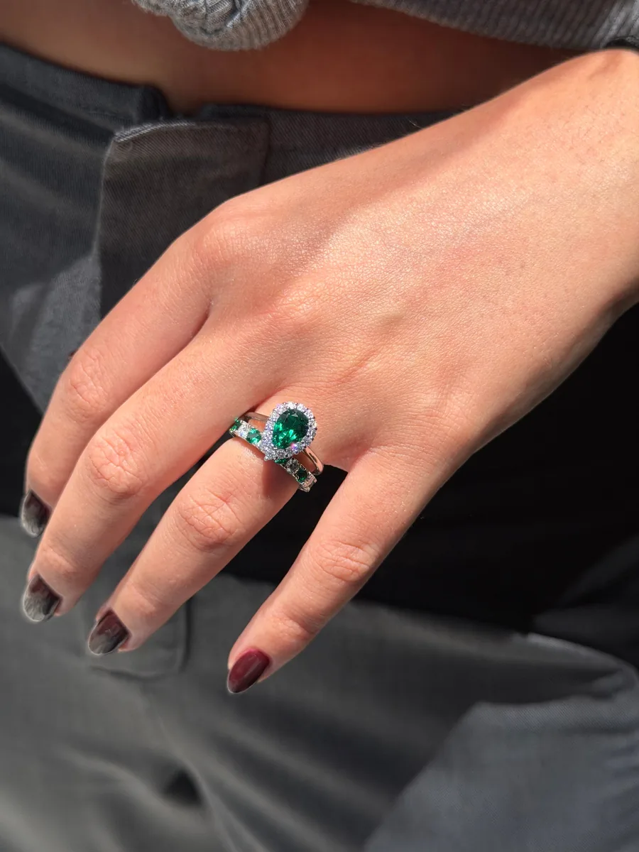 Pear-Cut Emerald Halo Ring worn