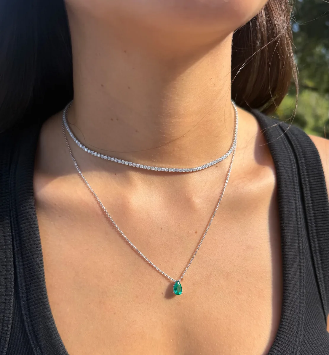 Pear Cut Emerald Necklace Pendant worn