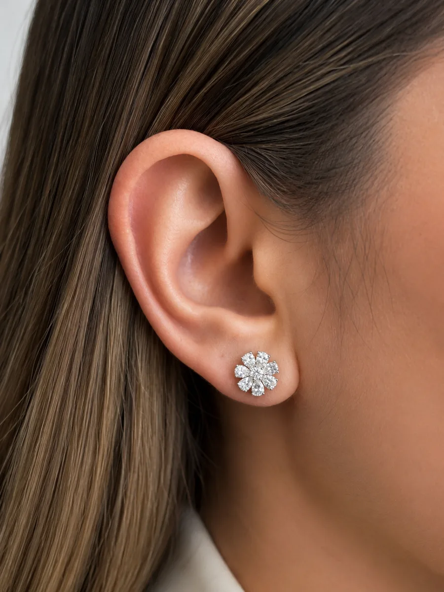 Petal Spark earrings worn